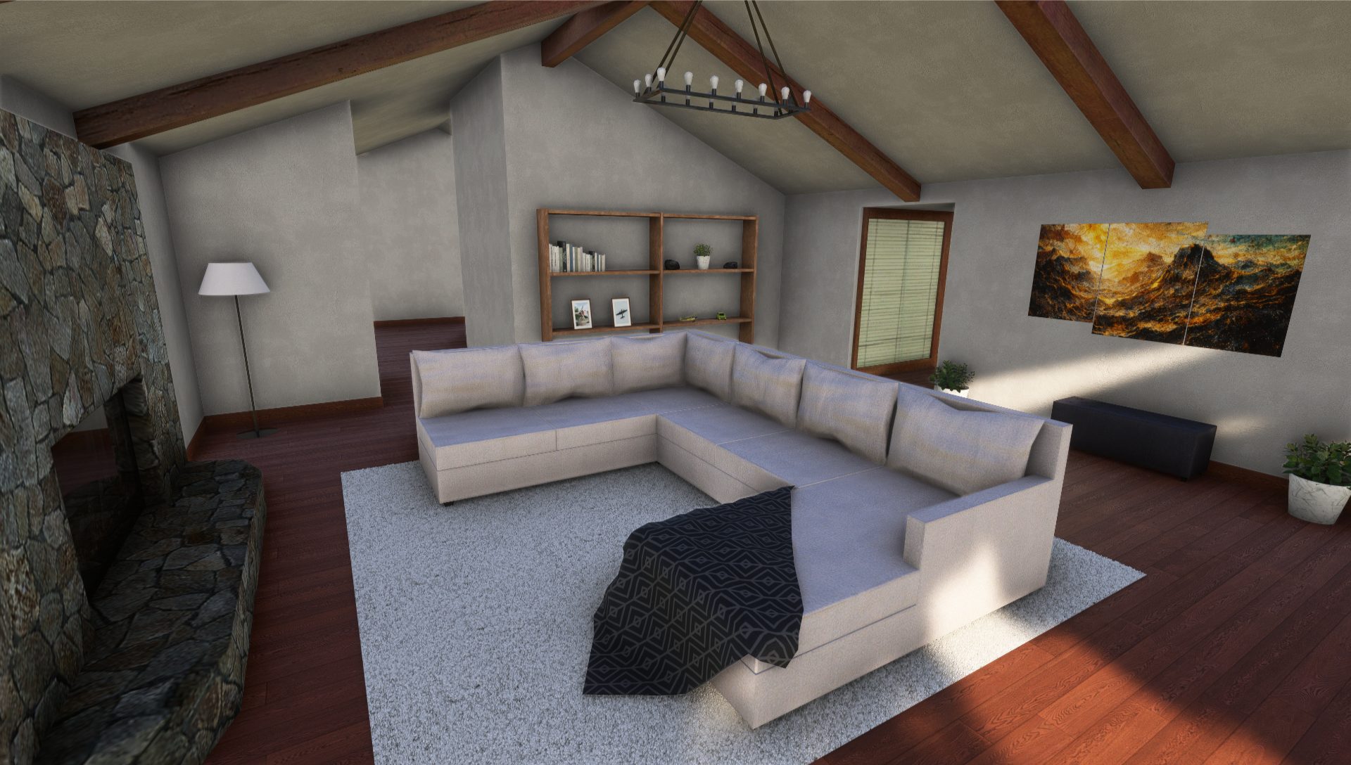 A white couch with a dark blanked draped over the corner on top of a white rug