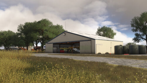 Limberlost Ranch open Hangar from across the asphalt apron